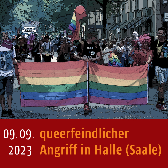 Mehrere Personen halten zwei Regenbogenflaggen, hinter ihnen laufen viele Menschen.